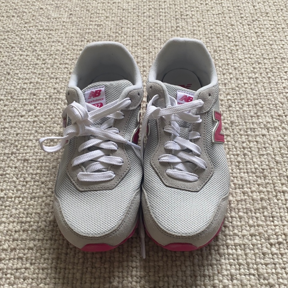 Pink and gray new balance shoes